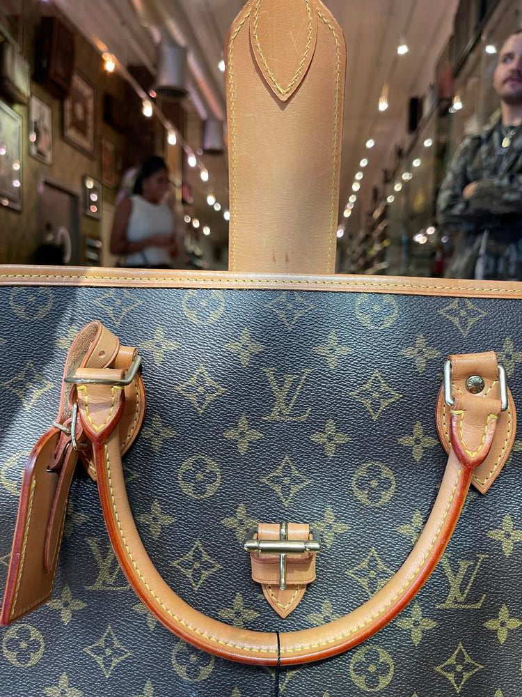 Louis Vuitton Monogram Rivoli Business Bag (peel in pocket)