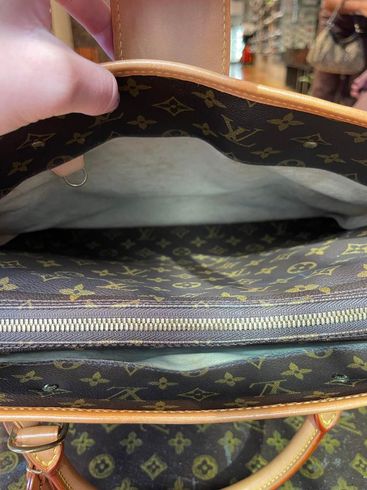 Louis Vuitton Monogram Rivoli Business Bag (peel in pocket)