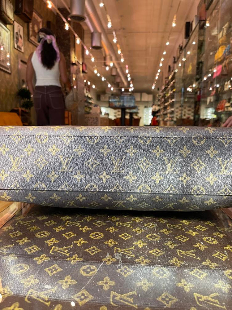 Louis Vuitton Monogram Rivoli Business Bag (peel in pocket)