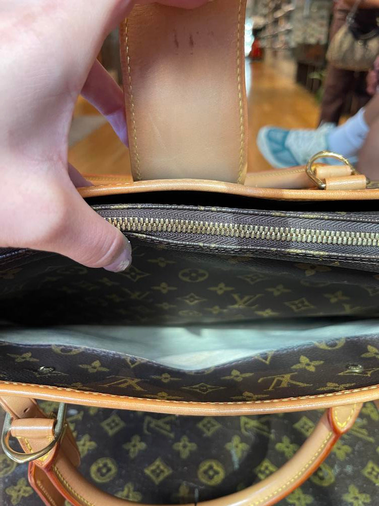 Louis Vuitton Monogram Rivoli Business Bag (peel in pocket)